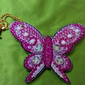 5 for $10.  Pink and Purple Double Sided Butterfly Keychain